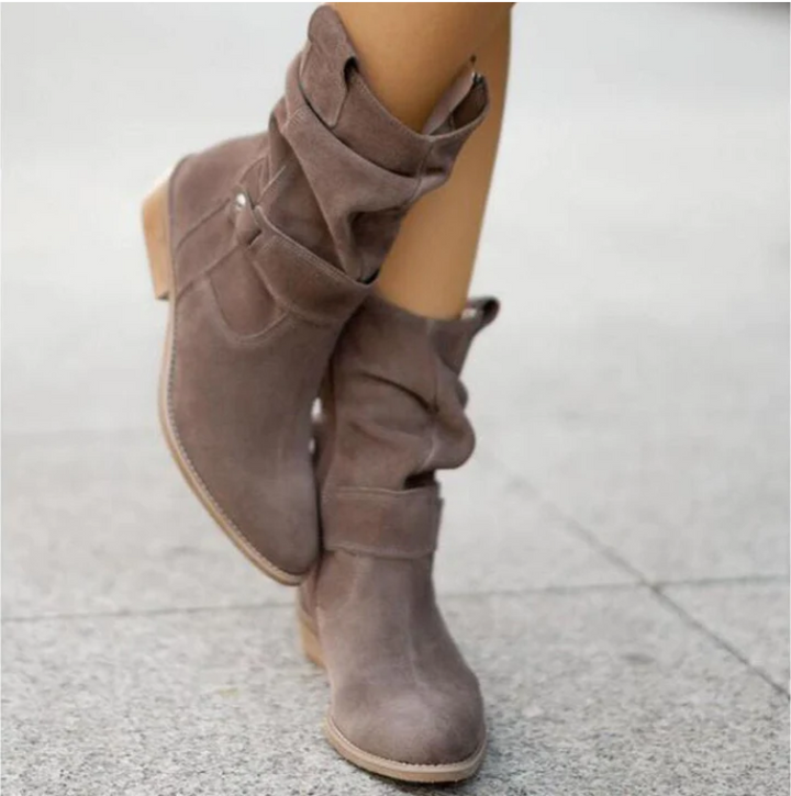 "Women's suede slouchy ankle boots with low heel, beige, side view, chic and comfortable, perfect for any outfit."