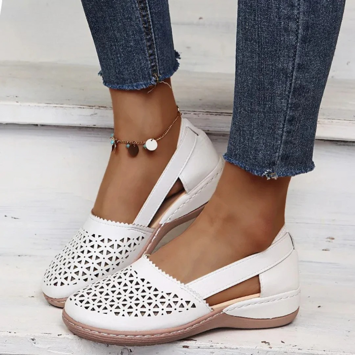Women's supportive orthopedic walking shoes with sleek design and vibrant colors for comfort and style.