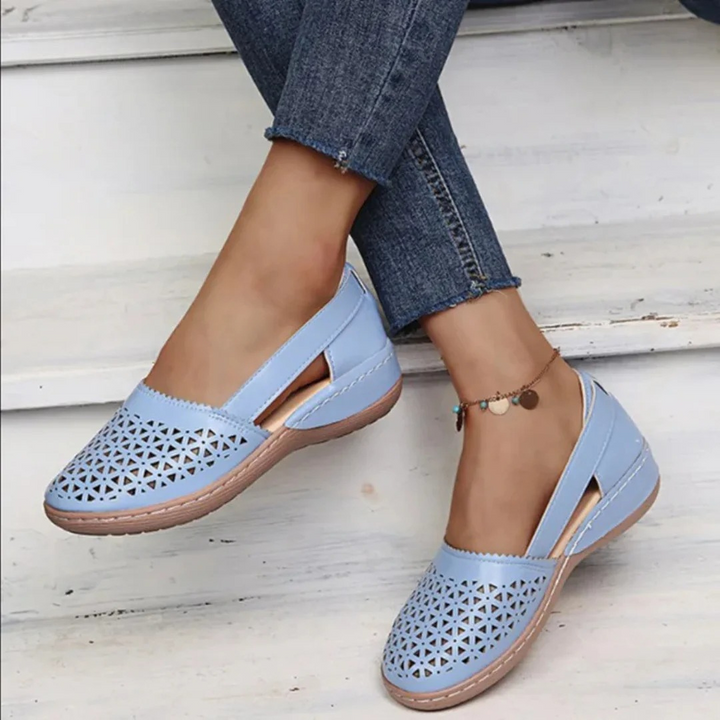 Women's supportive orthopedic walking shoes with sleek design and vibrant colors for comfort and style.
