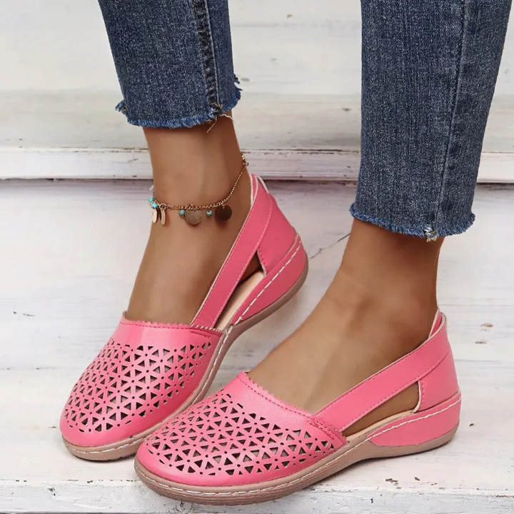 Women's supportive orthopedic walking shoes with sleek design and vibrant colors for comfort and style.