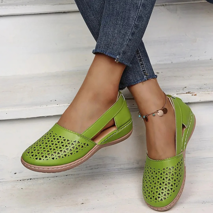 Women's supportive orthopedic walking shoes with sleek design and vibrant colors for comfort and style.