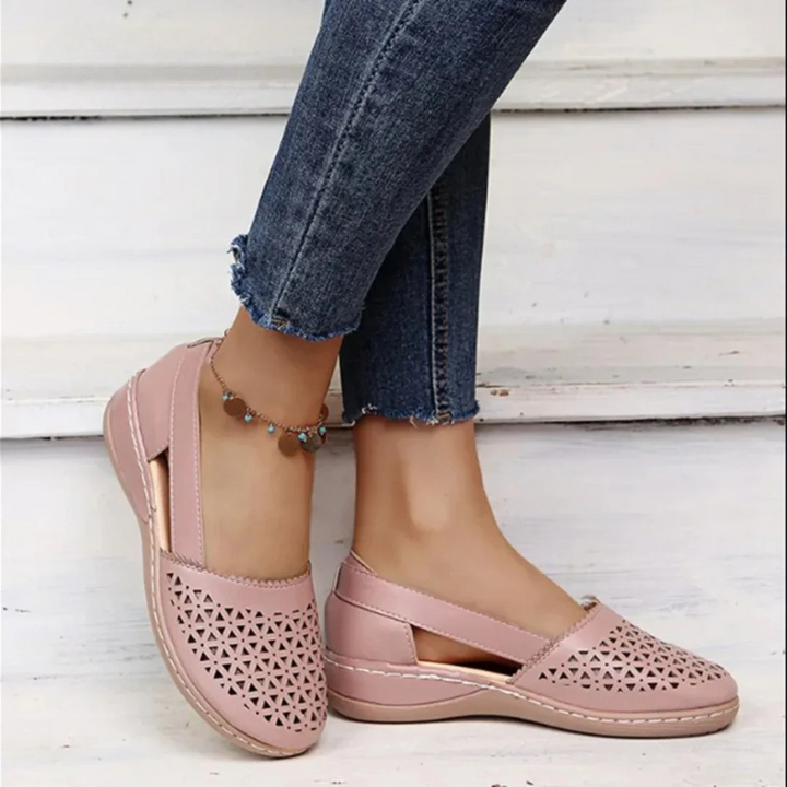 Women's supportive orthopedic walking shoes with sleek design and vibrant colors for comfort and style.