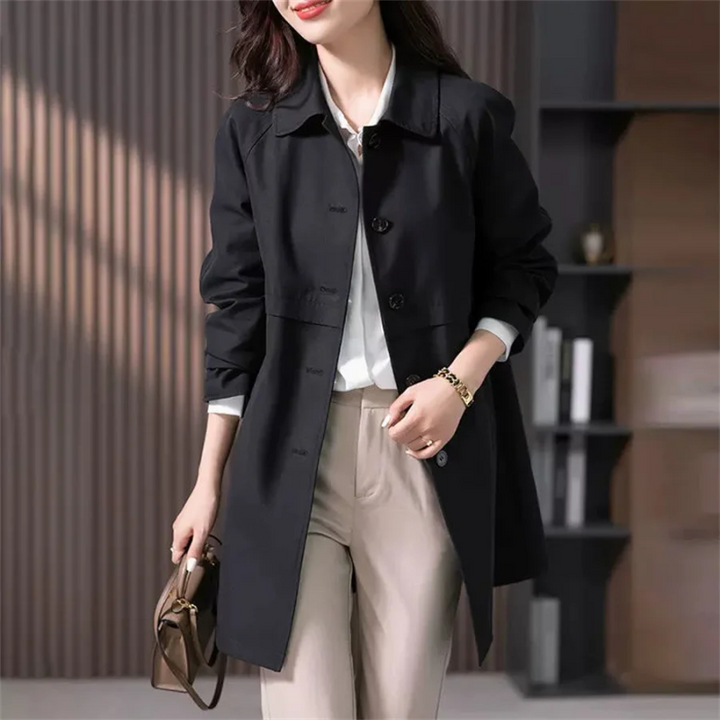 Women's trench coat, tailored fit, mid-thigh length, classic collar, single-breasted, sleek silhouette, black and dark blue.