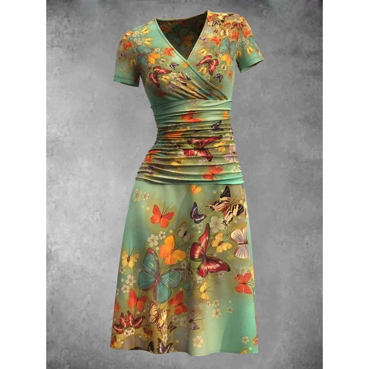 "Women's V-Neck A-Line Dress with Butterfly Print, short sleeves, ruched waist for chic silhouette and comfort, front view."