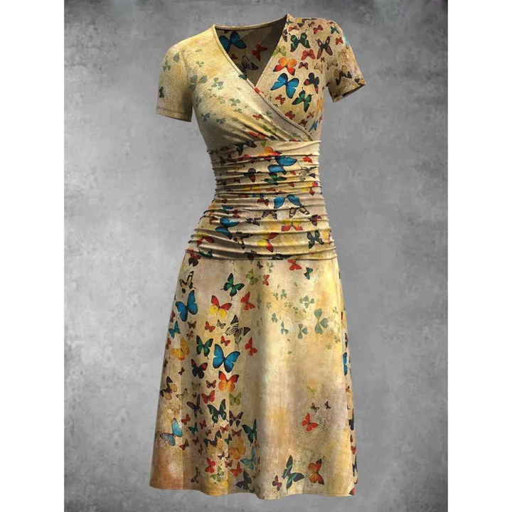 "Women's V-Neck A-Line Dress with Butterfly Print, short sleeves, ruched waist for chic silhouette and comfort, front view."