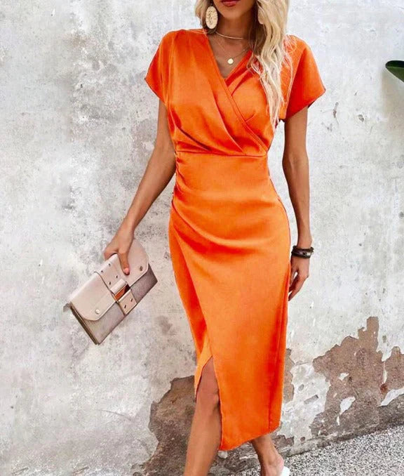 "Women's V-Neck Bodycon Midi Dress with front split, elegant silhouette, chic sleeveless design, day-to-night fashion."
