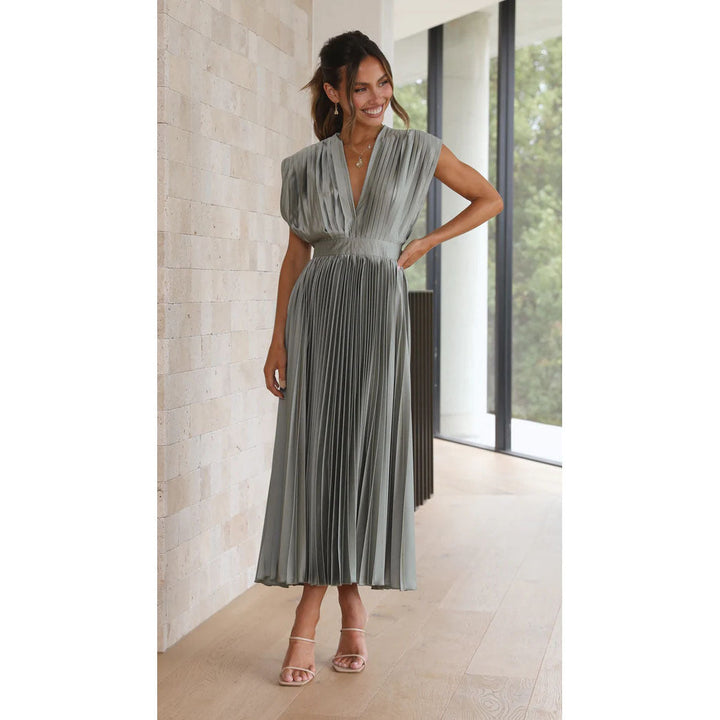 "Women's V-neck sleeveless pleated maxi dress; elegant flowing silhouette for formal events."