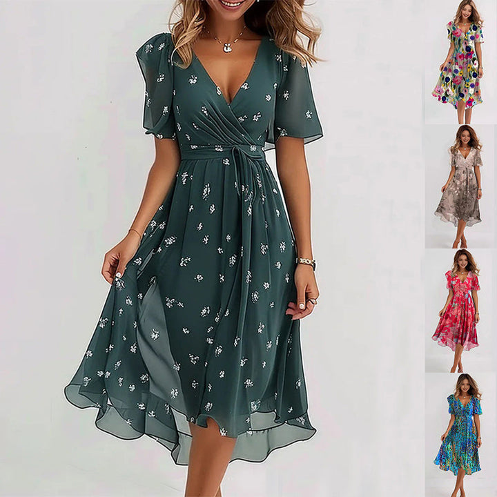 Women's V-neck wrap dress with flutter sleeves, cinched waist, and A-line silhouette in pastel hues; perfect for any occasion