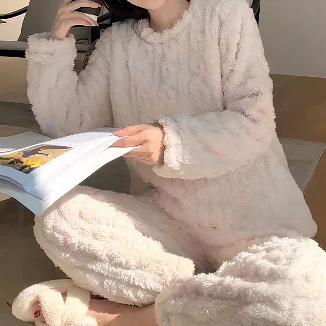 "Women's warm fleece pajama set in gray, showcasing cozy sleepwear ideal for cold nights with a relaxed fit and soft fabric."