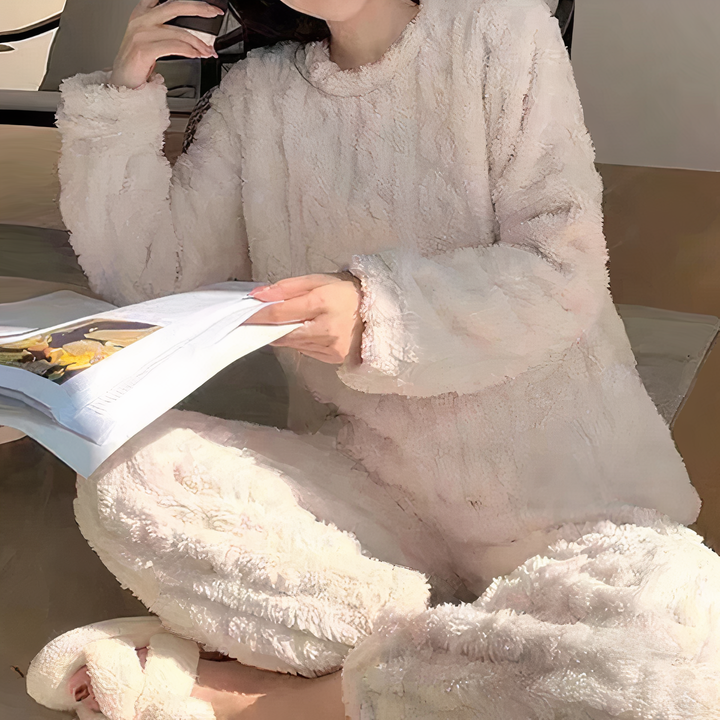"Women's warm fleece pajama set in gray, showcasing cozy sleepwear ideal for cold nights with a relaxed fit and soft fabric."