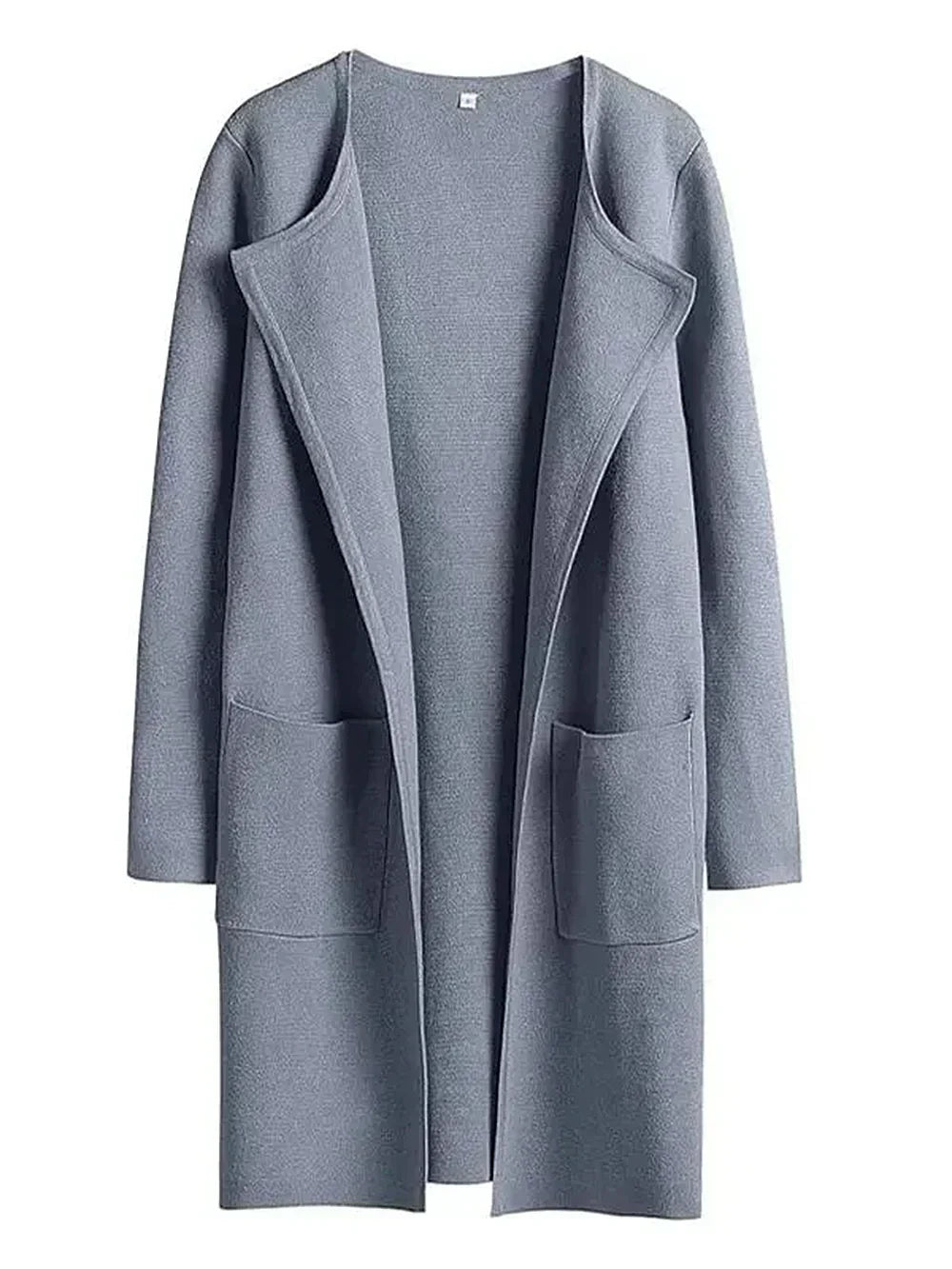 "Women's wool blend knee-length coat with wide lapel and patch pockets, showcasing a relaxed fit and minimalist design."