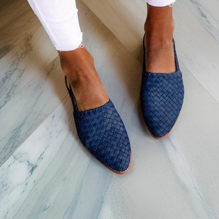 Women's woven leather sandals with slingback, featuring a hand-woven design and cushioned sole for all-day comfort.